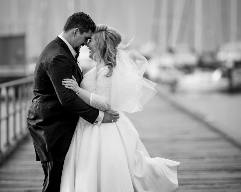 Sandy By The Bay - Bride and Groom on the pier